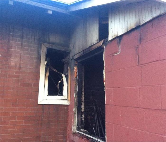 Broken Windows after House Fire in Ogden