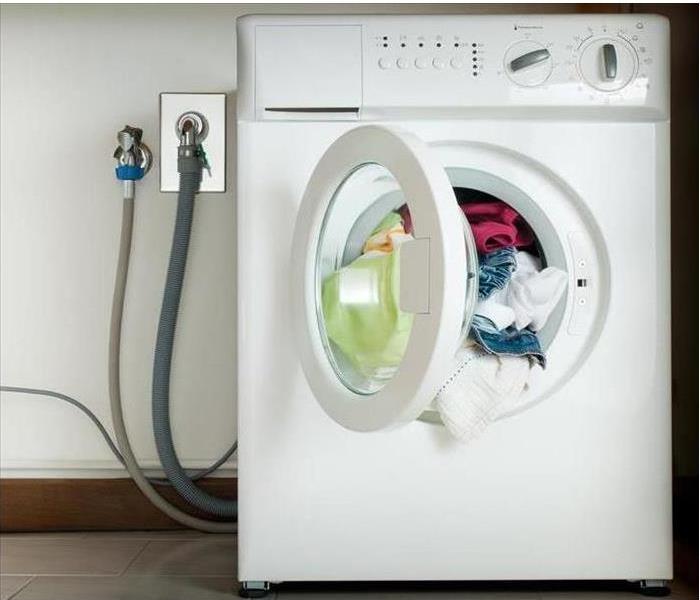 Dryer with clothes inside.